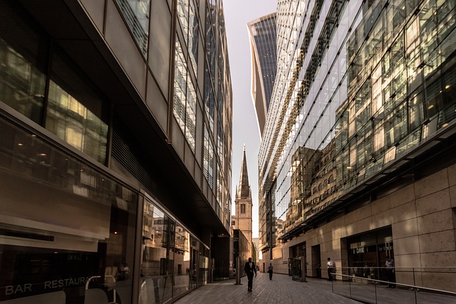 Moorgate street view in City of London financial district with office buildings and pedestrians